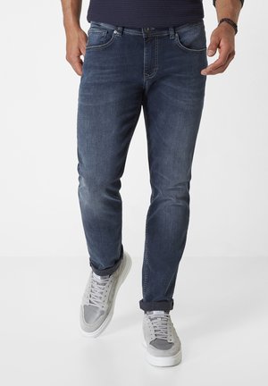 Slim fit jeans - blue black used and moustache