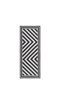 Écharpe à motif noir et blanc présentant de larges rayures diagonales et une forme rectangulaire, avec des bords effilochés et une texture lisse.