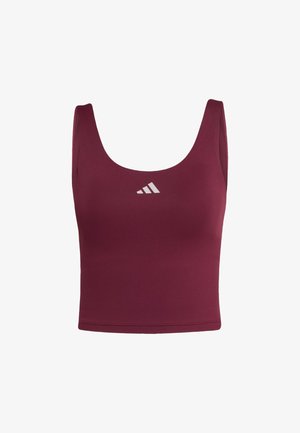 Bordeauxrode crop top met brede bandjes en een ronde halslijn, gemaakt van rekbare stof. Voorzien van een klein wit logo gecentreerd op de borst.