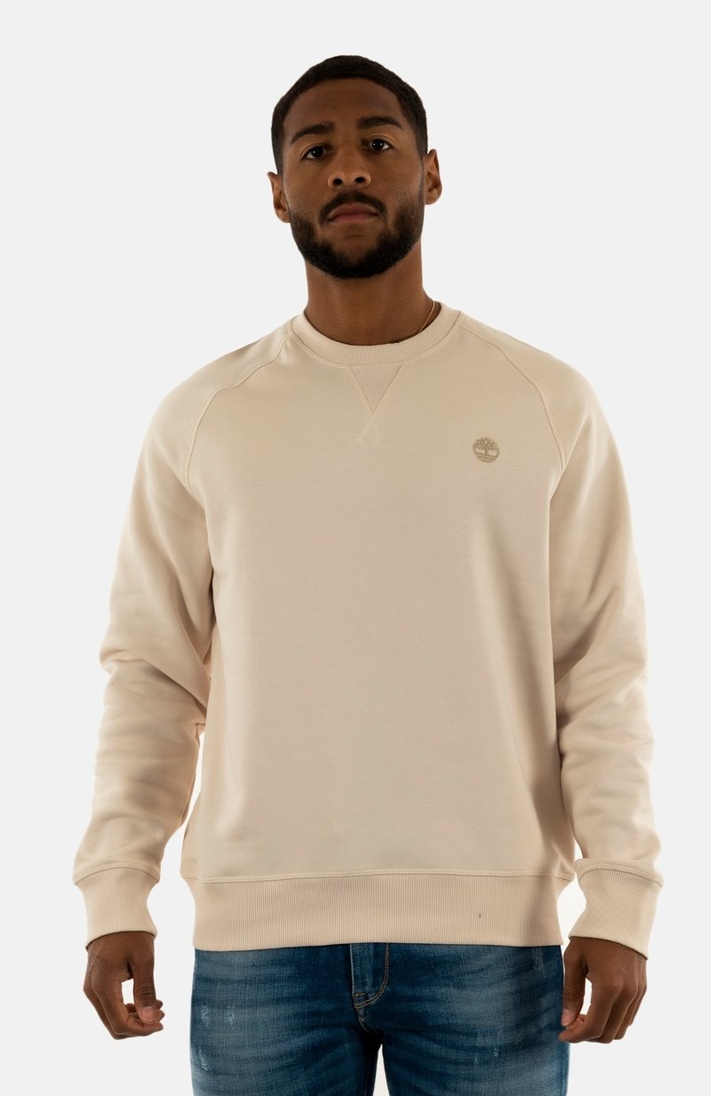 Felpa beige con collo rotondo, polsini e fondo a costine, caratterizzata da un piccolo logo ricamato sul petto. Materiale in misto cotone.