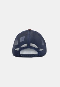 Casquette en maille bleu marine avec un dos structuré, fermeture par bouton-pression en plastique et doublure intérieure blanche unie. Présente un petit bouton texturé sur le dessus.