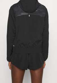 Puma Chaqueta de running - black