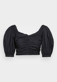 Top corto negro con mangas abullonadas, que presenta detalles fruncidos en la parte frontal y puños elásticos. Textura suave y diseño ajustado.
