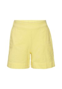 Gula bomullsshorts med en avslappnad passform, som har en mjuk textur, elastisk midja och en längd som når mitt på låret.