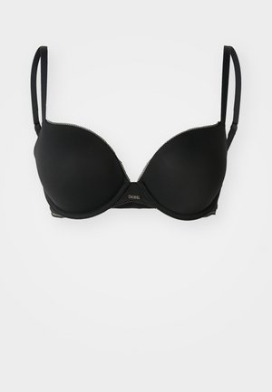 Soutien-gorge rembourré noir avec des bretelles fines et réglables, texture lisse, garniture festonnée le long des bords et un petit logo doré au centre.