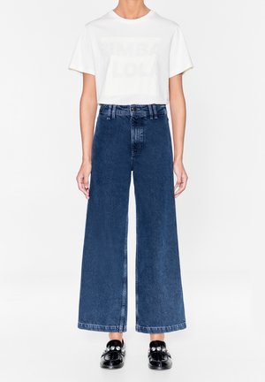 Flared Jeans - dark blue
