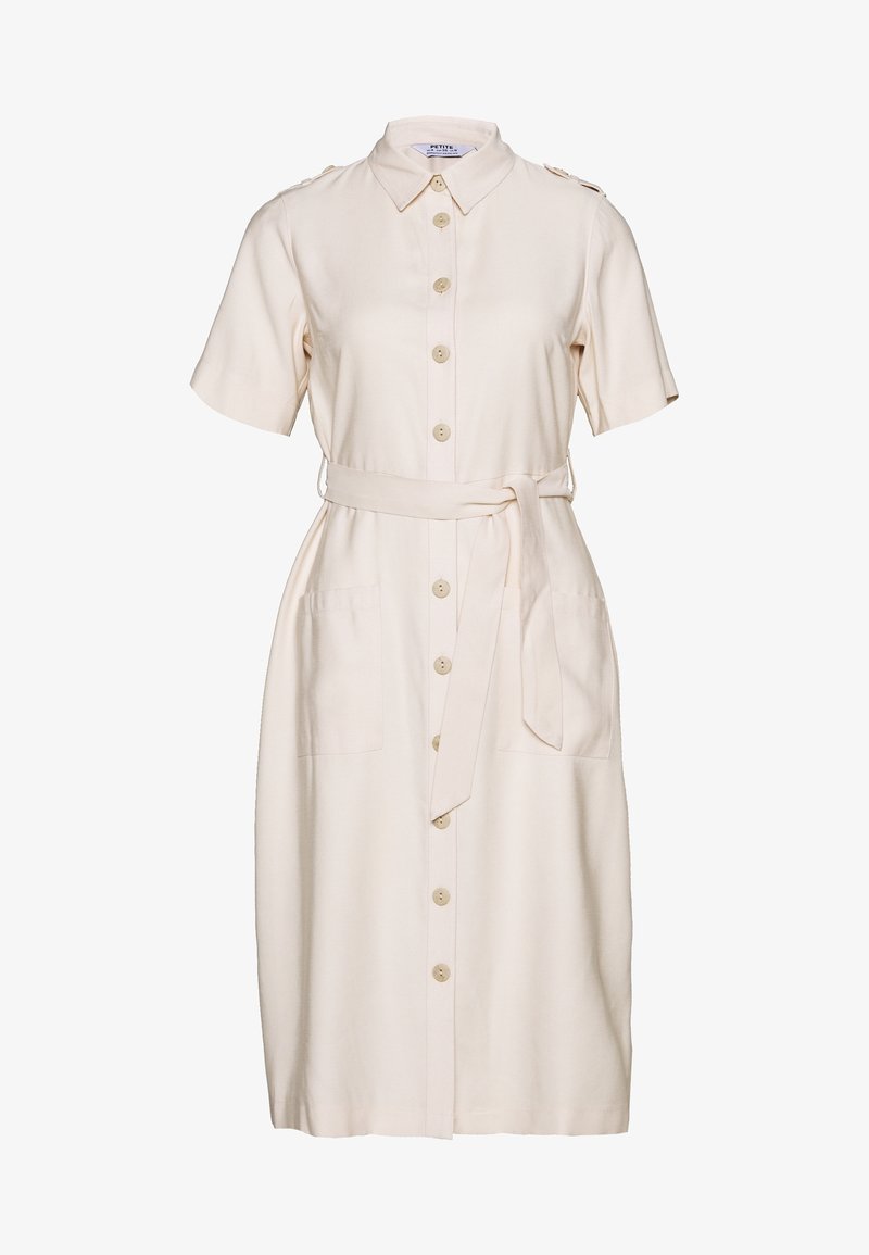 Krémově zbarvené šaty s krátkými rukávy, zapínáním na knoflíky vpředu, dvěma kapsami, páskem v pase a ramenními pásky. Hladká texturou látky.