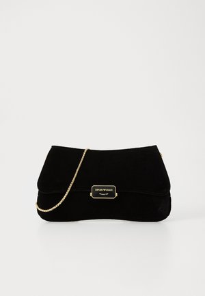 Black velvet clutch handbag with gold chain strap and gold Emporio Armani Milano 1981 logo plaque on front flap.