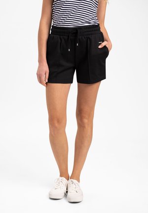N LILIA - Tracksuit bottoms - black