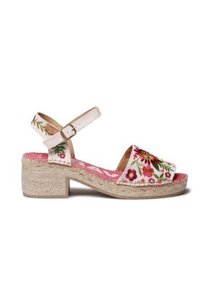 Tikanditega kiilkontsadega sandaalid valge kangast pealsega, lillemustrid, roosa sisetald ja punutud jutu kand. Pannal kinnitusega pahkluu rihmal.