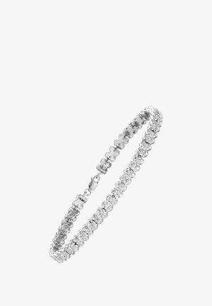 Sudraba aproce ar pārmaiņus ziedu un gludām saitēm, ar omā kopā turēšanas mehānismu. Atspoguļo gaismu ar spīdīgu apdari.