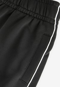 Next REGULAR FIT - Träningsbyxor - black
