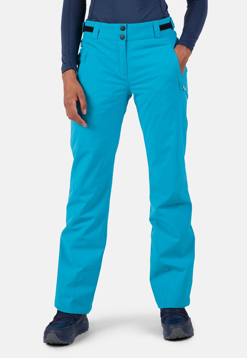 Helle blaue wasserdichte Hose mit geradem Bein, zwei Fronttaschen und schwarzen Akzenten am Bund. Geeignet für Outdoor-Aktivitäten.
