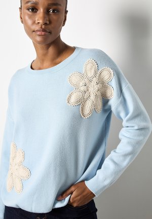 - Sweter