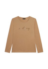 T-shirt beige a maniche lunghe con scollatura rotonda e un design di testo cursivo lucido che recita "qualcosa di straordinario" al centro.