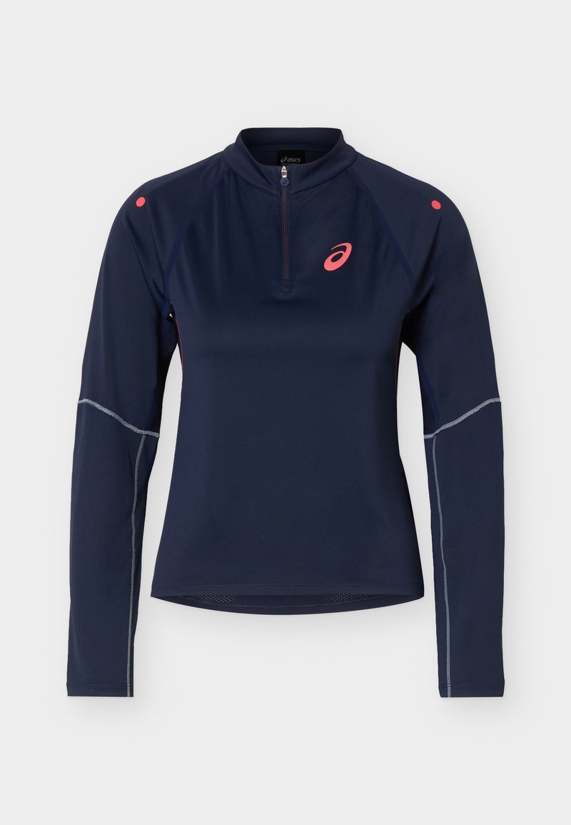 Marineblå langærmet atletisk top med kvart lynlås, pink ASICS-logo på brystet og små pink prikker på skuldrene.