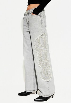 EMBROIDERED BAGGY  - Jeans a zampa - mottled dark grey