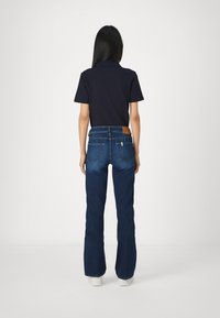 LIU JO AUTHENTIC PANT  - Traperice krojene za nošenje s čizmama - blue denim