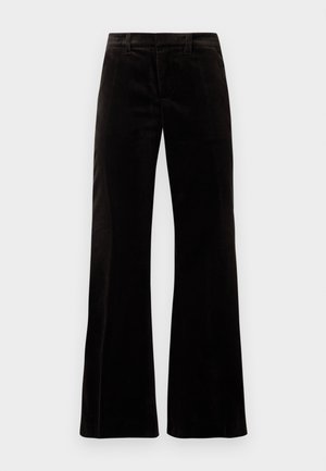 Pantalones de pana negra acampanados con una cinturilla estructurada, textura suave y aberturas de pierna anchas, que crean una silueta relajada.