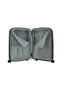 Valigia nera con interno grigio, dotata di due scomparti, tasche in rete e cerniere; rivestimento morbido con un sottile motivo su tutta la superficie.