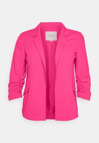 Blazer rosa in tessuto testurizzato, con rever a punta, maniche arricciate e design aperto davanti. Presenta due tasche laterali per praticità.