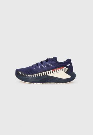 Men's running shoe in navy mesh with white accents. Lightweight design features a textured sole and striped pattern on the side.