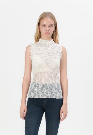 Blonde bluse med høy krage, korte volangermer og intrikate blomstermønstre. Kremfarge, tettsittende silhuett, semitransparent tekstur.