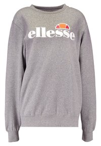 Sweat-shirt gris en mélange de coton, avec un col rond, des manches longues, et un grand logo blanc "ellesse" avec un accent coloré.