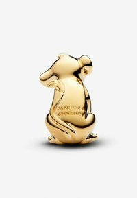 Charm plaqué or en forme d'animal assis, avec des surfaces lisses et des logos en relief au dos. Design arrondi avec une finition brillante.