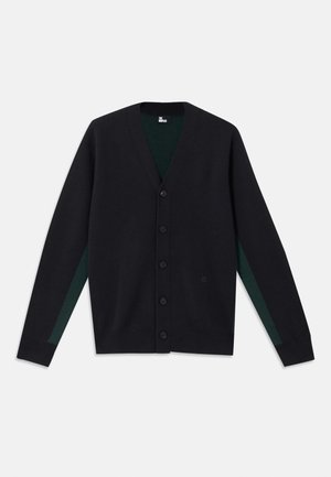 Black cardigan with a V-neck, six buttons, contrasting dark green side stripes, and a ribbed texture on sleeves and hem.