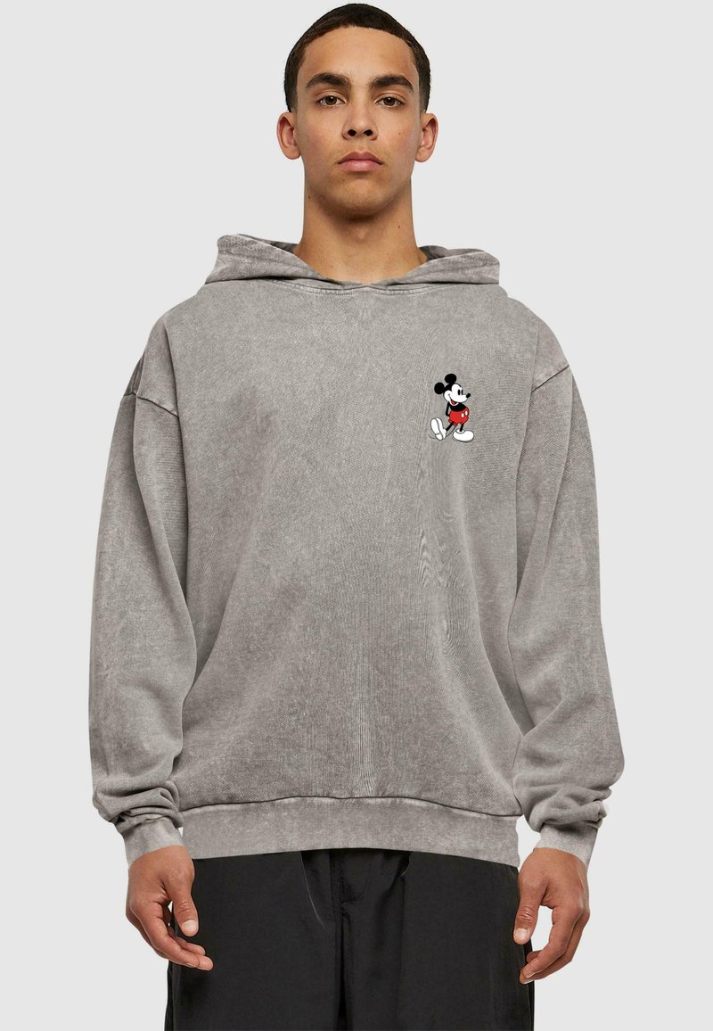 Gray pullover hoodie made of soft cotton blend, featuring a front pocket, ribbed cuffs, and an embroidered Mickey Mouse design on the chest.