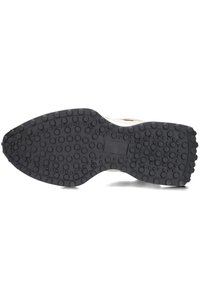 Black rubber shoe sole with rounded grip patterns, featuring a raised texture and a slight curve near the toe area.