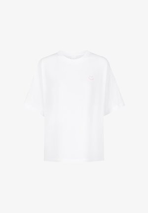 Witte katoenen T-shirt met een ontspannen pasvorm, korte mouwen en een kleine roze smiley afbeelding op de linkerborst.