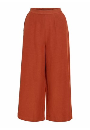 Rozsda színű bő szárú nadrág rugalmas derékpánttal, elöl húzott redőkkel és laza, rövid fazonnal.