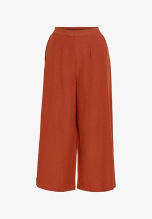 Rozsda színű bő szárú nadrág rugalmas derékpánttal, elöl húzott redőkkel és laza, rövid fazonnal.