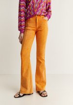 Flared Jeans – orange