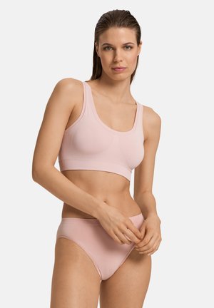 Light pink seamless bra and matching high-waisted panties; soft, stretchy fabric with a smooth texture and no visible seams.