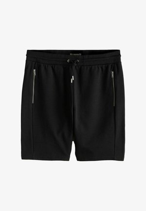 Pantaloni scurți casual negri cu talie elastică, șnur reglabil și două buzunare frontale verticale cu fermoar.