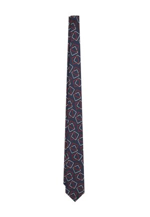 Corbata azul marina hecha de una tela suave que presenta un patrón geométrico de hexágonos con contornos en blanco y rojo. Forma estrecha y elegante con punta afilada.