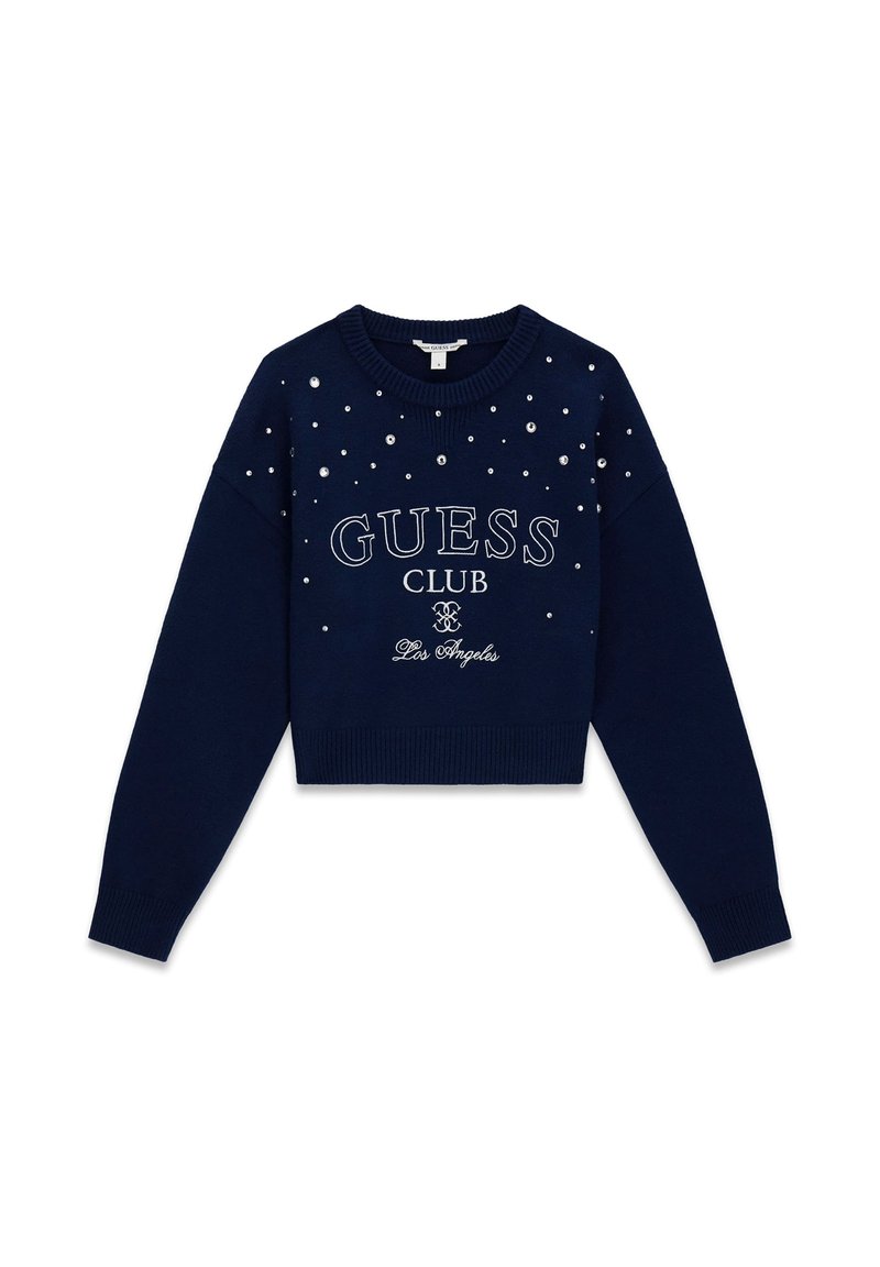 Pull court bleu marine avec col rond, orné de strass clairs dispersés. "GUESS CLUB Los Angeles" imprimé en blanc.