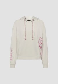 Cremfarbener Hoodie mit cropped Design, ausgestattet mit geflochtenen, pinken Kordeln und bedrucktem Text in Pink auf dem linken Ärmel und der Seite.