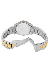 Montre en acier inoxydable avec un bracelet en argent et or, boîtier rond et fermoir à boucle. Dos présenté sans marquage visible.
