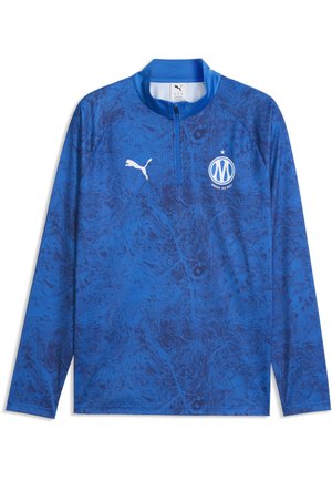 Blå langærmet sportstrøje med abstrakt mørkt mønster, hvidt Puma-logo til venstre og Marseille fodboldklubvåben på højre bryst.