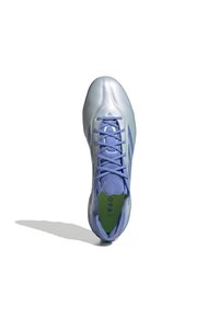 Light blue soccer shoe with a glossy finish. Features laces, a textured tongue, and contrasting accents on the sides.