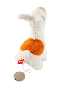 White plush dog toy with orange accent on the back, upright design, floppy ears, and a textured, soft surface. Includes a tan toggle base.