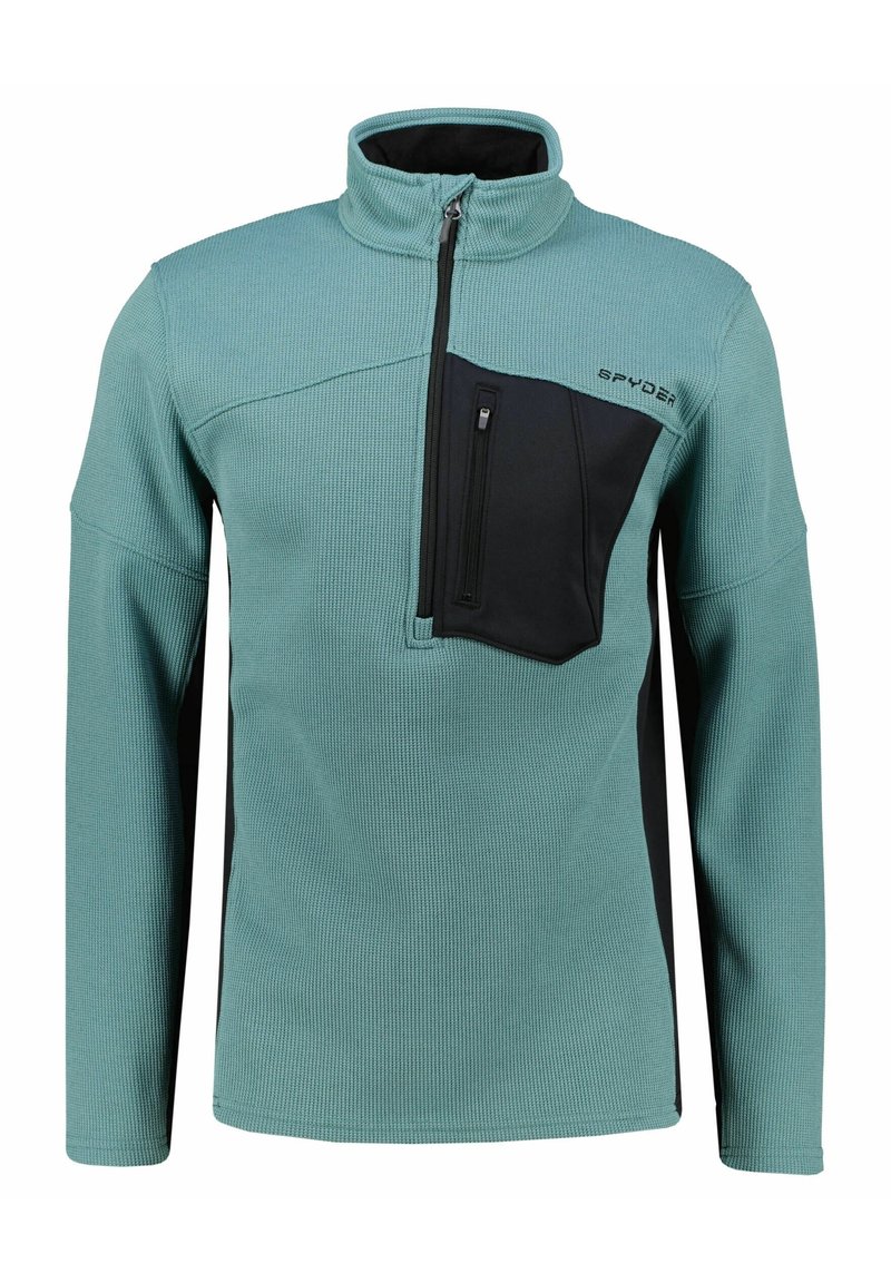 Pullover in pile di un blu teal chiaro con tasca sul petto nera, colletto alto e tessuto testurizzato. Presenta maniche lunghe e chiusura con zip.