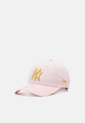 Pink cap made of cotton, featuring a gold embroidered New York logo on the front, a curved brim, and ventilation holes on the crown.