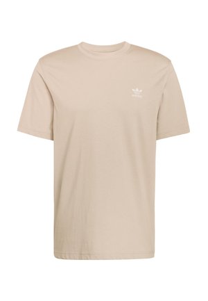 Béžové bavlněné tričko s krátkými rukávy, kulatým výstřihem a malým bílým logem Adidas na levé straně hrudi. Měkká textura, volný střih.