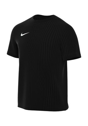 T-shirt sportif noir à manches courtes avec un col rond et un logo Nike blanc sur le côté gauche de la poitrine.