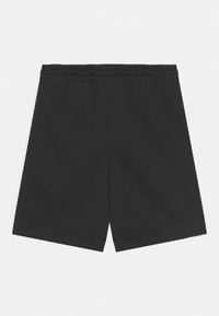 Black, lightweight shorts made from smooth fabric. Features an elastic waistband and straight cut, suitable for casual wear.